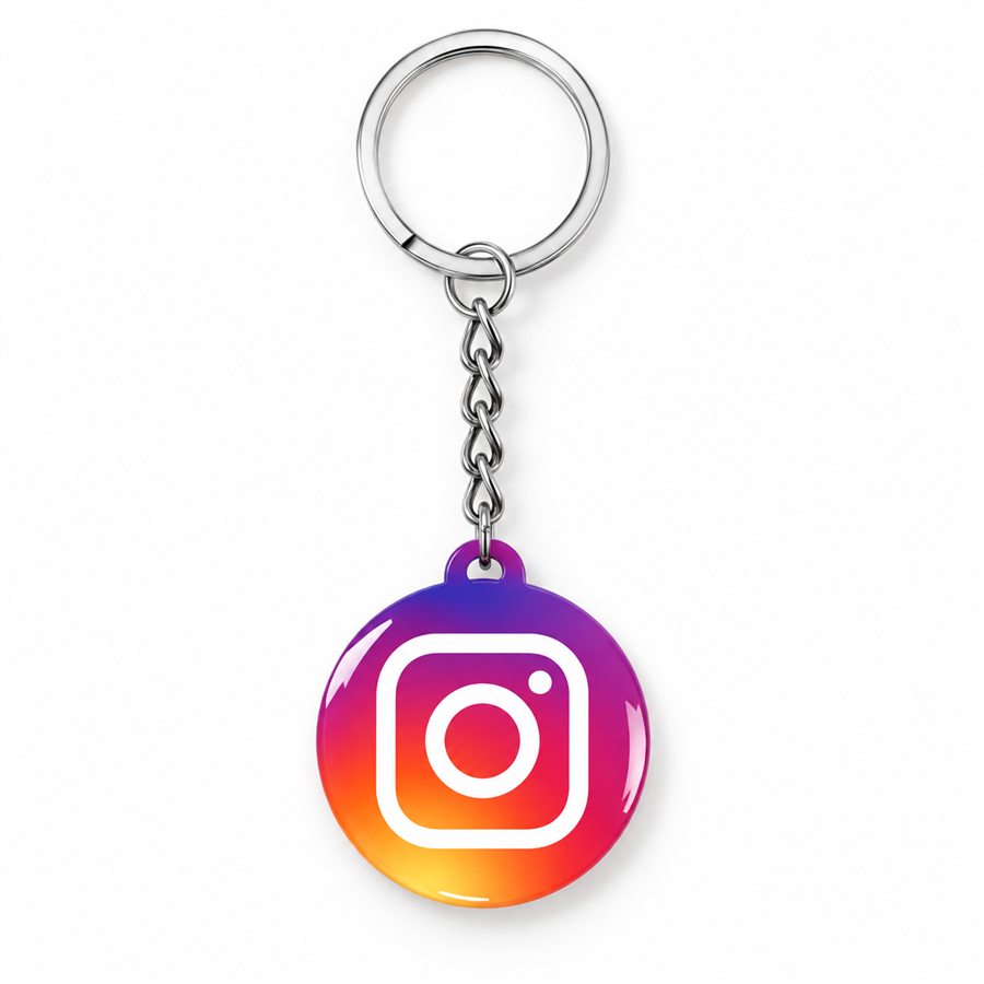 A round NFC keychain on a split ring, printed with the Instagram mark.